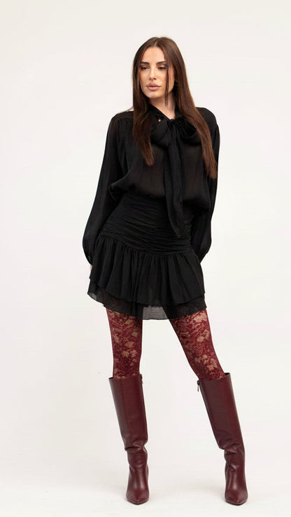 Blusa fluida con lazada frontal