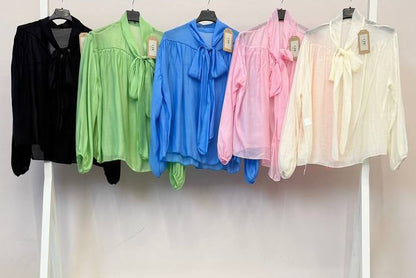 Blusa fluida con lazada frontal